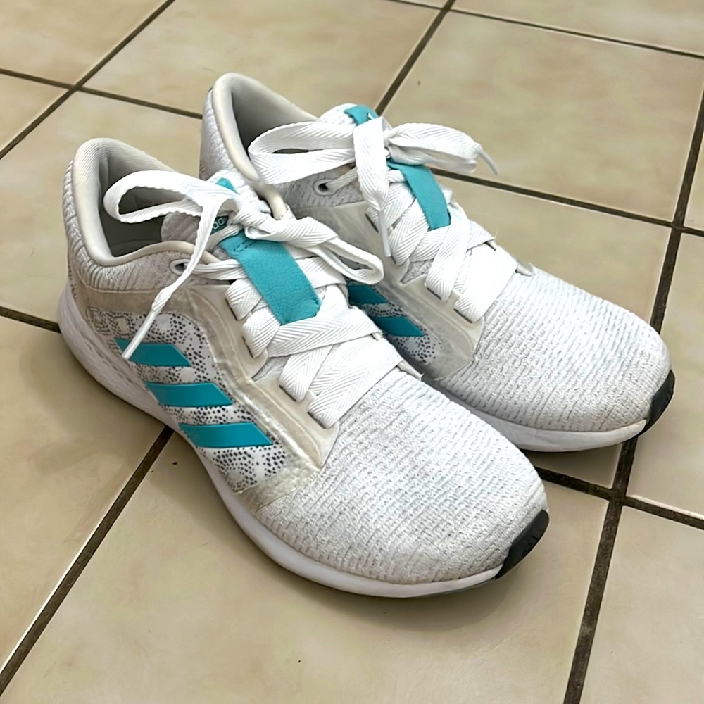 White and blue adidas sneakers